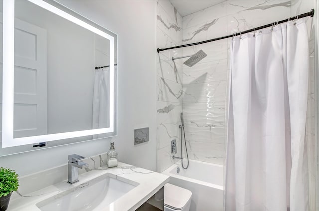 bathroom with vanity, toilet, and shower / bath combo