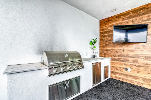 view of patio / terrace with a sink and area for grilling