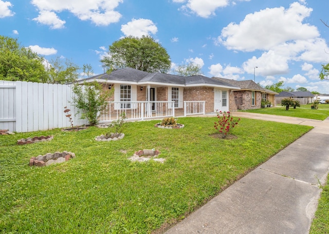 1035 Forestburg Dr, Houston, TX 77038 - ranch-style house with a porch, brick siding, and concrete driveway