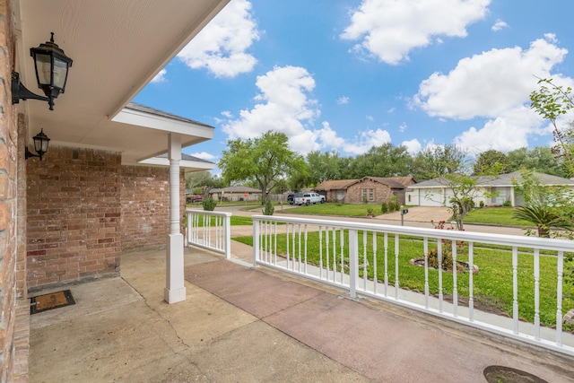 1035 Forestburg Dr, Houston, TX 77038 - view of patio featuring a residential view
