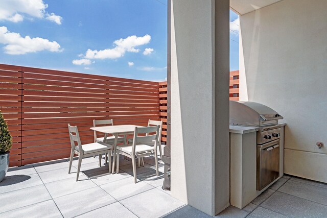 2323 W Main St Unit 603, Houston, TX 77098 - view of patio / terrace featuring outdoor dining area and area for grilling