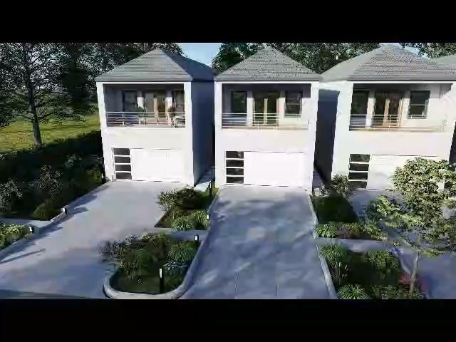 garage featuring concrete driveway