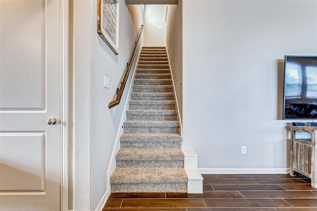 29114 Autumn Brook Dr, Fulshear, TX 77441 - stairway featuring baseboards and wood finish floors