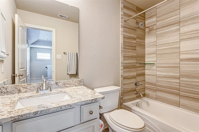 29114 Autumn Brook Dr, Fulshear, TX 77441 - bathroom with visible vents, toilet, vanity, and shower / washtub combination