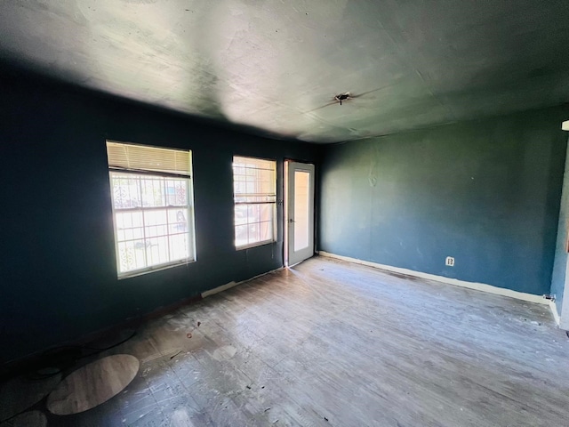 7413 W Knoll St, Houston, TX 77028 - unfurnished room with baseboards and wood finished floors