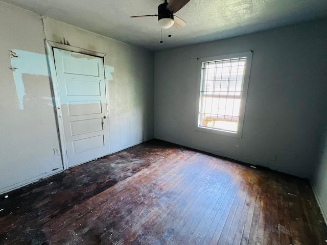7413 W Knoll St, Houston, TX 77028 - unfurnished room with hardwood / wood-style floors and ceiling fan