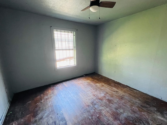 7413 W Knoll St, Houston, TX 77028 - unfurnished room with hardwood / wood-style floors and ceiling fan