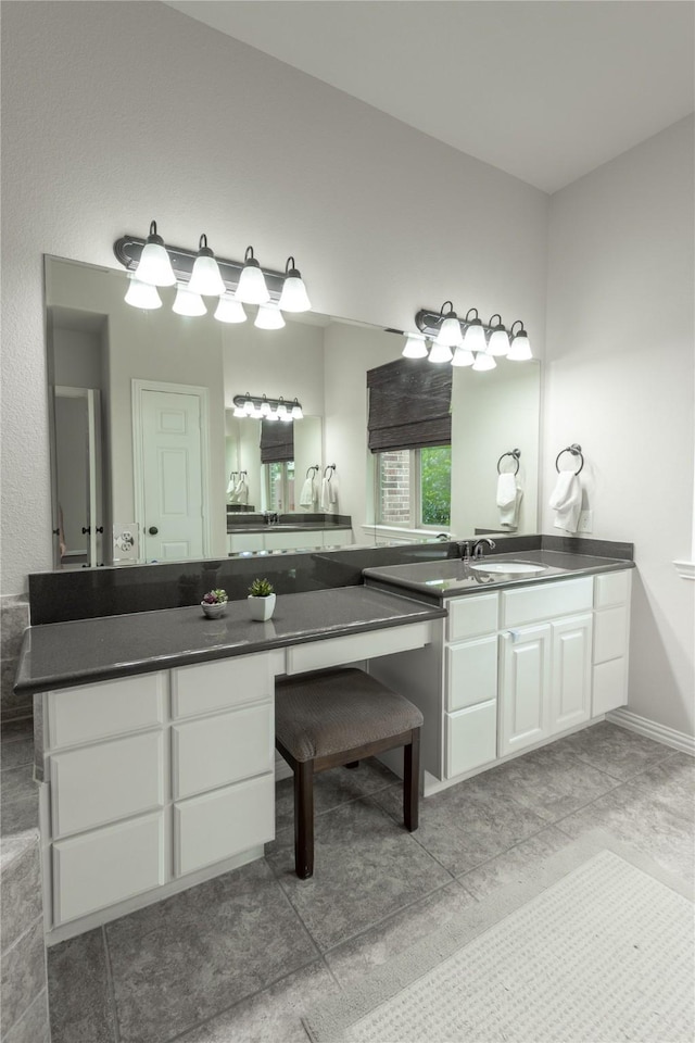 full bathroom with vanity