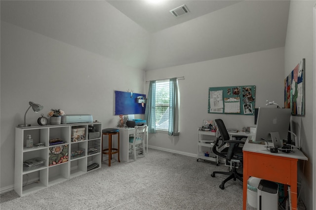 carpeted home office with visible vents, baseboards, and lofted ceiling