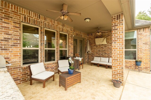 view of patio / terrace with outdoor lounge area, a ceiling fan, and a grill
