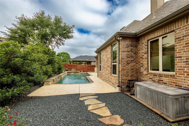 view of pool featuring a fenced in pool, a patio, and fence