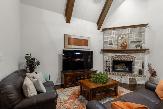 living room with high vaulted ceiling, a stone fireplace, beamed ceiling, and wood finished floors
