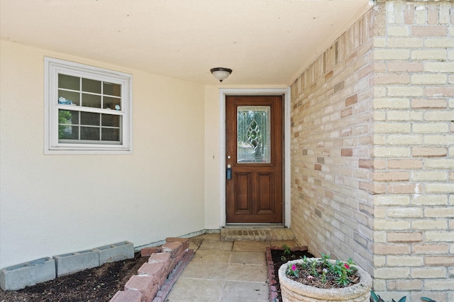 doorway to property with stucco siding