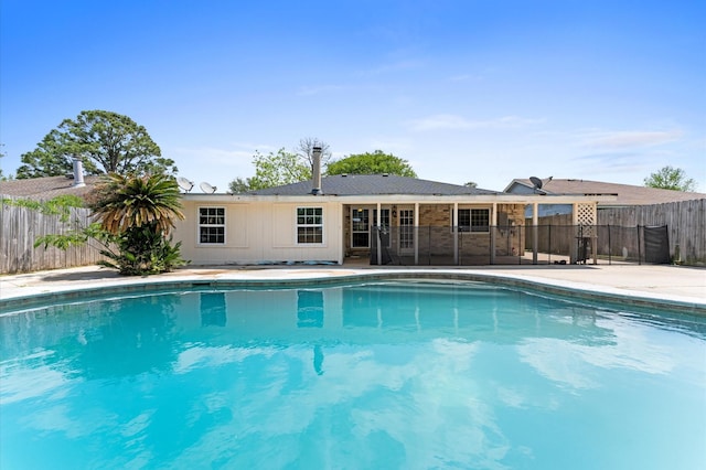 view of swimming pool with fence, a patio area, and a fenced in pool