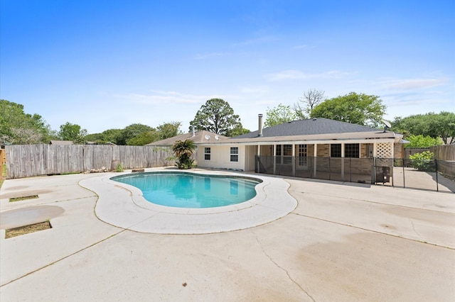 view of pool with a patio, a fenced backyard, and a fenced in pool