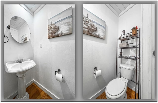 bathroom featuring toilet, ornamental molding, wood finished floors, and baseboards