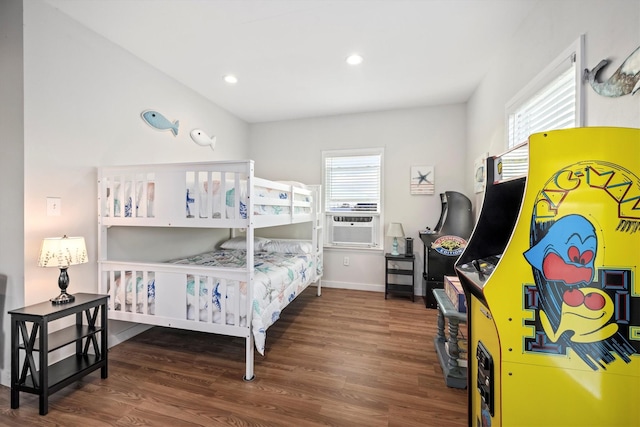 bedroom featuring baseboards, wood finished floors, cooling unit, and recessed lighting