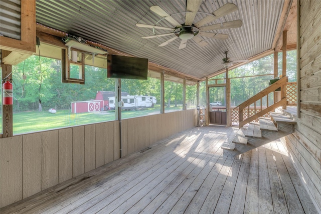 25 S Magnolia Ln, Shepherd, TX 77371 - wooden deck featuring a storage shed, a lawn, a ceiling fan, and an outdoor structure