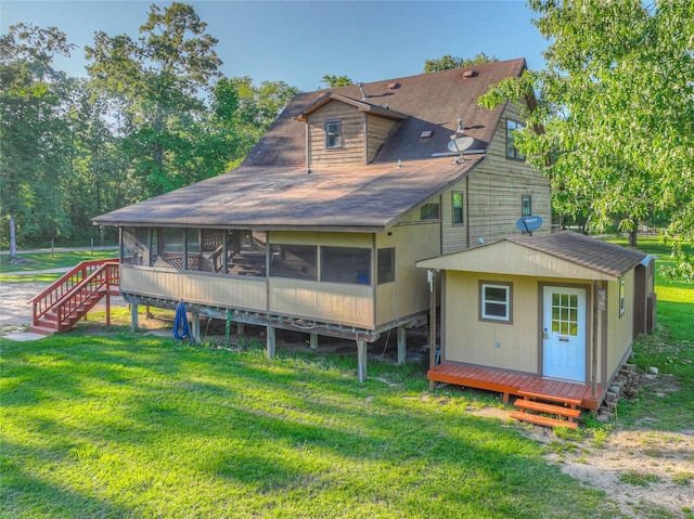 25 S Magnolia Ln, Shepherd, TX 77371 - rear view of property featuring a shingled roof, a sunroom, a yard, and a deck