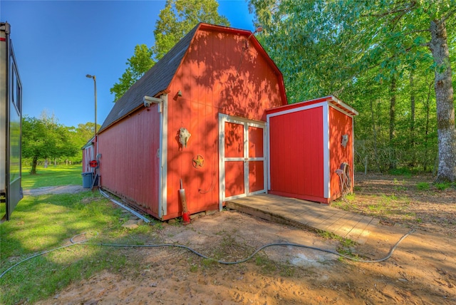 25 S Magnolia Ln, Shepherd, TX 77371 - view of outbuilding featuring an outdoor structure