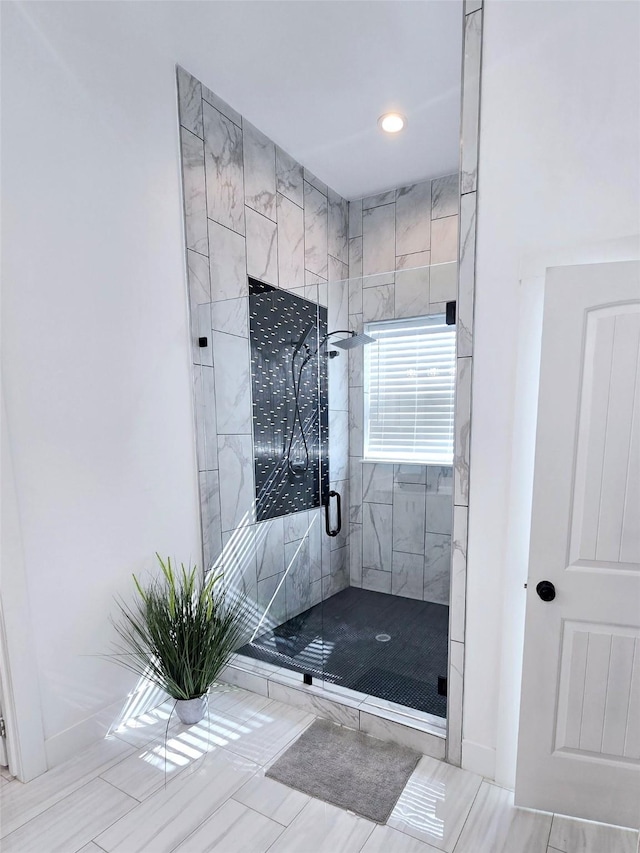 8006 Longridge Dr, Houston, TX 77055 - full bathroom with baseboards, a shower stall, and recessed lighting