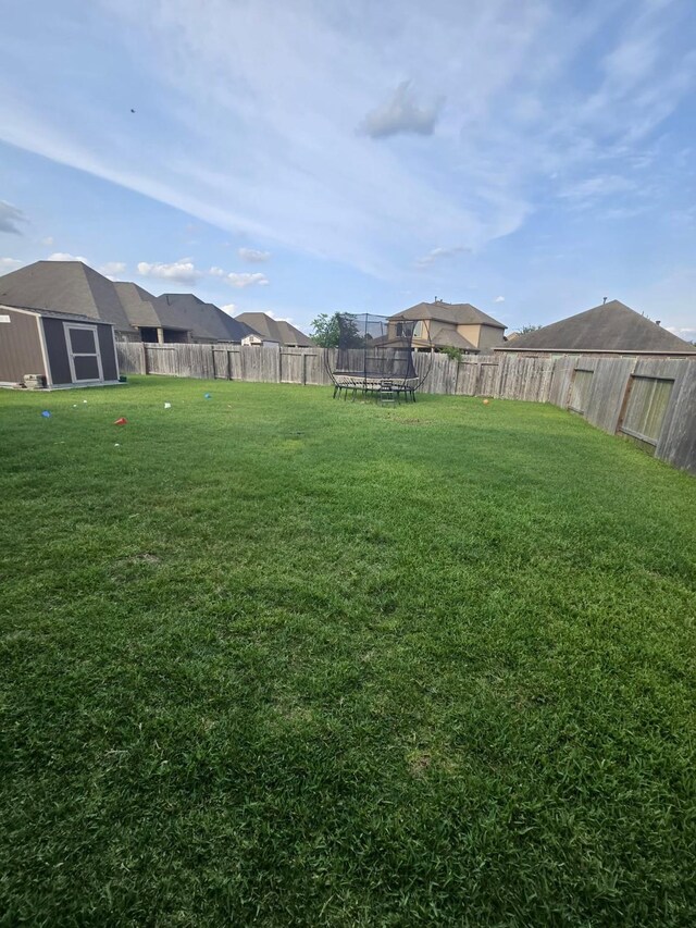 19003 Bene Vista Dr, Houston, TX 77084 - view of yard with a trampoline