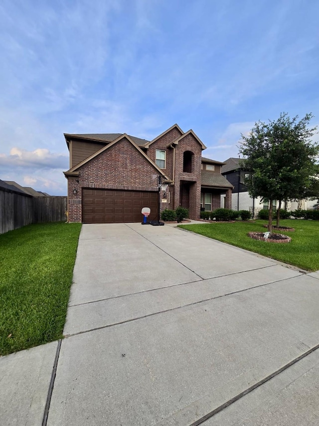 19003 Bene Vista Dr, Houston, TX 77084 - traditional-style home with brick siding, an attached garage, and driveway