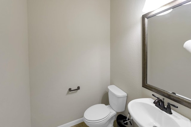 26818 Lindenwood Creek Ln, Katy, TX 77494 - half bath featuring a sink and toilet