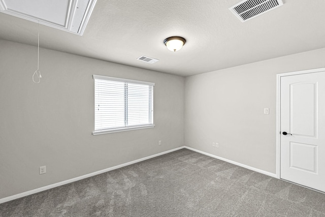 26818 Lindenwood Creek Ln, Katy, TX 77494 - carpeted empty room featuring attic access and baseboards