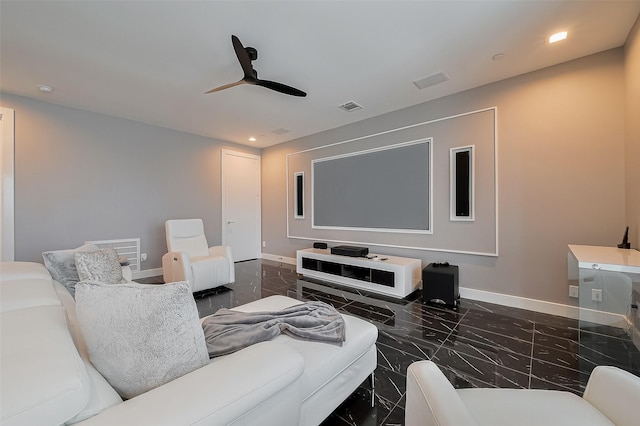 home theater room with recessed lighting, ceiling fan, marble finish floor, visible vents, and baseboards