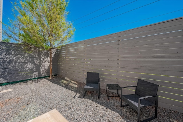 view of patio featuring a fenced backyard