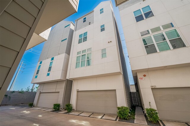 view of building exterior featuring an attached garage