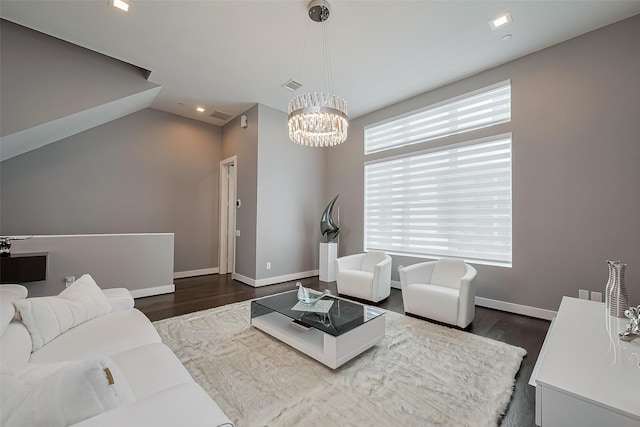 living room with recessed lighting, a chandelier, baseboards, visible vents, and dark wood-type flooring