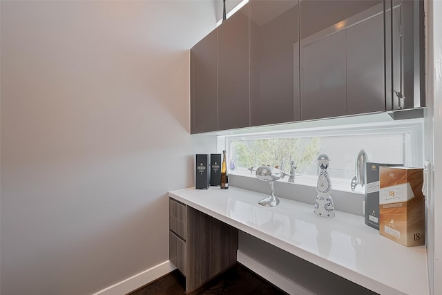 interior space featuring baseboards