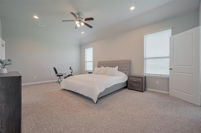 bedroom with baseboards, carpet flooring, multiple windows, and recessed lighting