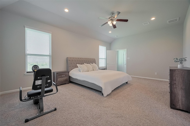 bedroom featuring visible vents, carpet floors, and multiple windows