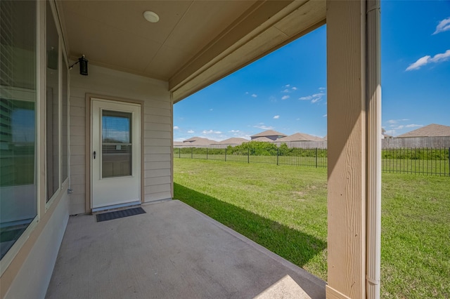 view of patio / terrace featuring fence