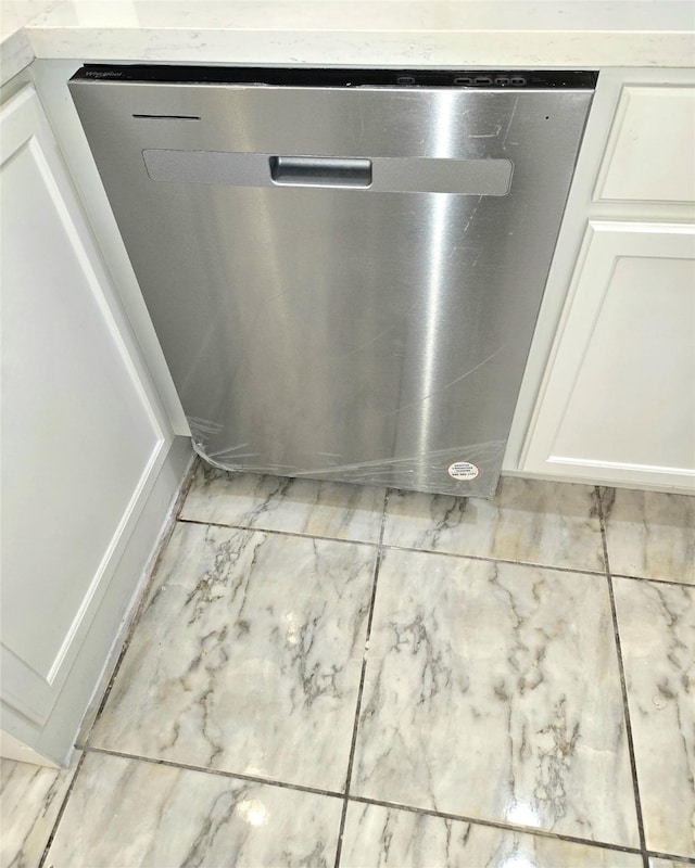 12325 Ridgeside Dr, Houston, TX 77072 - kitchen view of dishwasher and white cabinets