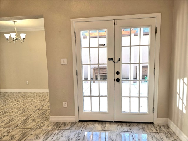 12325 Ridgeside Dr, Houston, TX 77072 - entryway with french doors, baseboards, a chandelier, crown molding, and healthy amount of natural light
