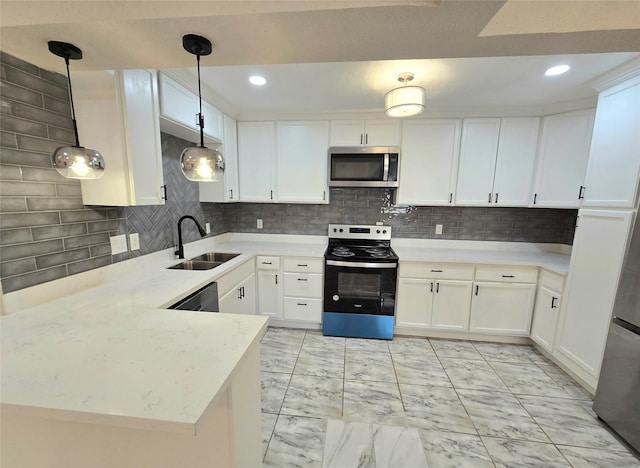 12325 Ridgeside Dr, Houston, TX 77072 - kitchen with electric stove, stainless steel microwave, a sink, backsplash, and recessed lighting