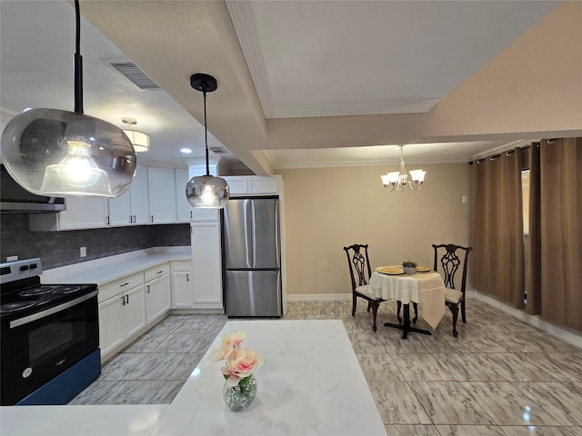 12325 Ridgeside Dr, Houston, TX 77072 - kitchen with appliances with stainless steel finishes, crown molding, white cabinetry, tasteful backsplash, and a chandelier
