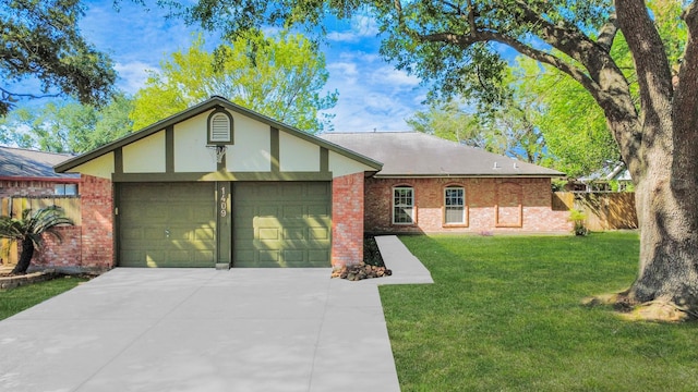 1409 N Park Ridge Dr, Deer Park, TX 77536 - ranch-style house featuring a garage, concrete driveway, brick siding, and stucco siding