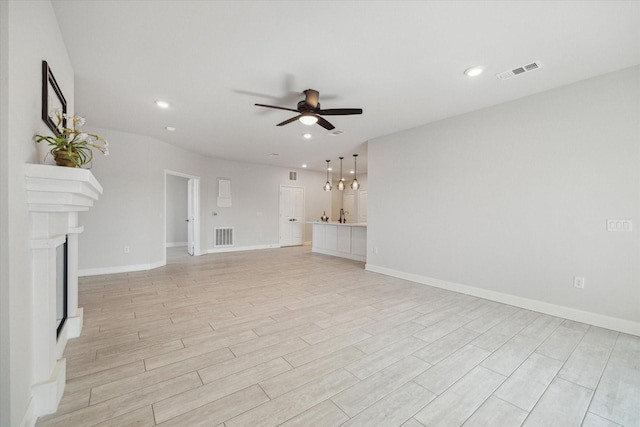 6804 Westview Dr Unit 1407, Houston, TX 77055 - unfurnished living room featuring recessed lighting, a ceiling fan, visible vents, and light wood-style floors