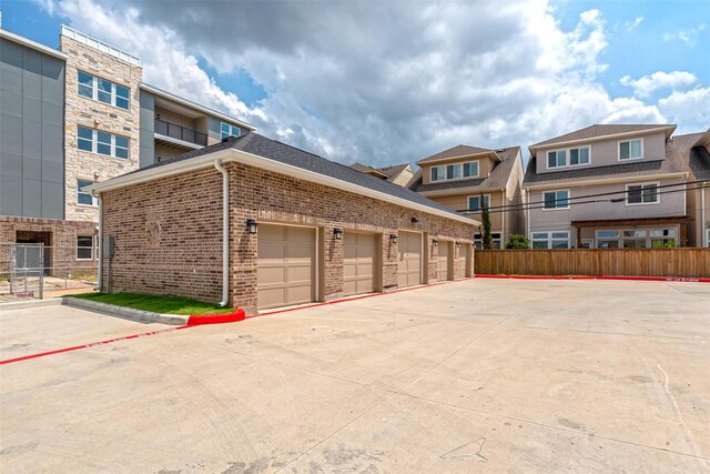 6804 Westview Dr Unit 1407, Houston, TX 77055 - exterior space featuring fence and brick siding