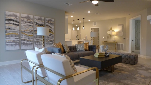 6804 Westview Dr Unit 1407, Houston, TX 77055 - living room with a ceiling fan, baseboards, and visible vents