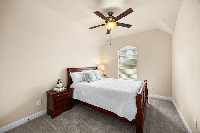 carpeted bedroom featuring baseboards, ceiling fan, and lofted ceiling