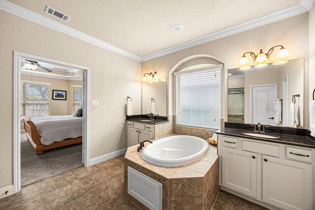 bathroom featuring crown molding, a sink, a shower stall, visible vents, and a bath