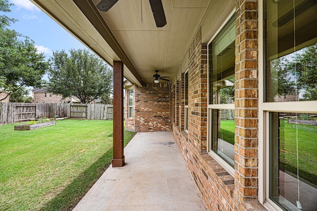 view of patio / terrace with a fenced backyard and ceiling fan