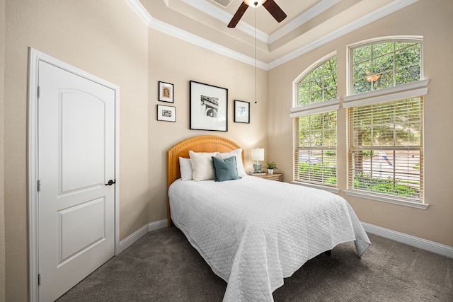 bedroom featuring crown molding, carpet, and baseboards