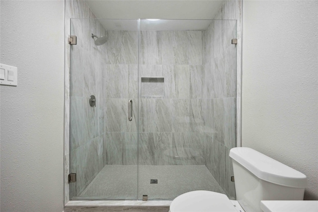 5206 Willow Glen Dr, Houston, TX 77033 - full bathroom with a stall shower and toilet